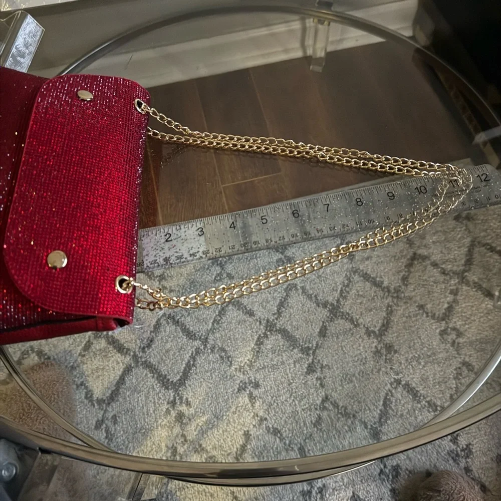 Elegant Red Clutch with Gold Chain